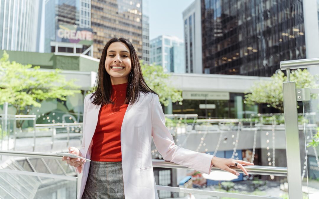 beautiful-smiling-indian-woman-holding-mobile-phon-2026-03-19-02-20-25-utc-1-2
